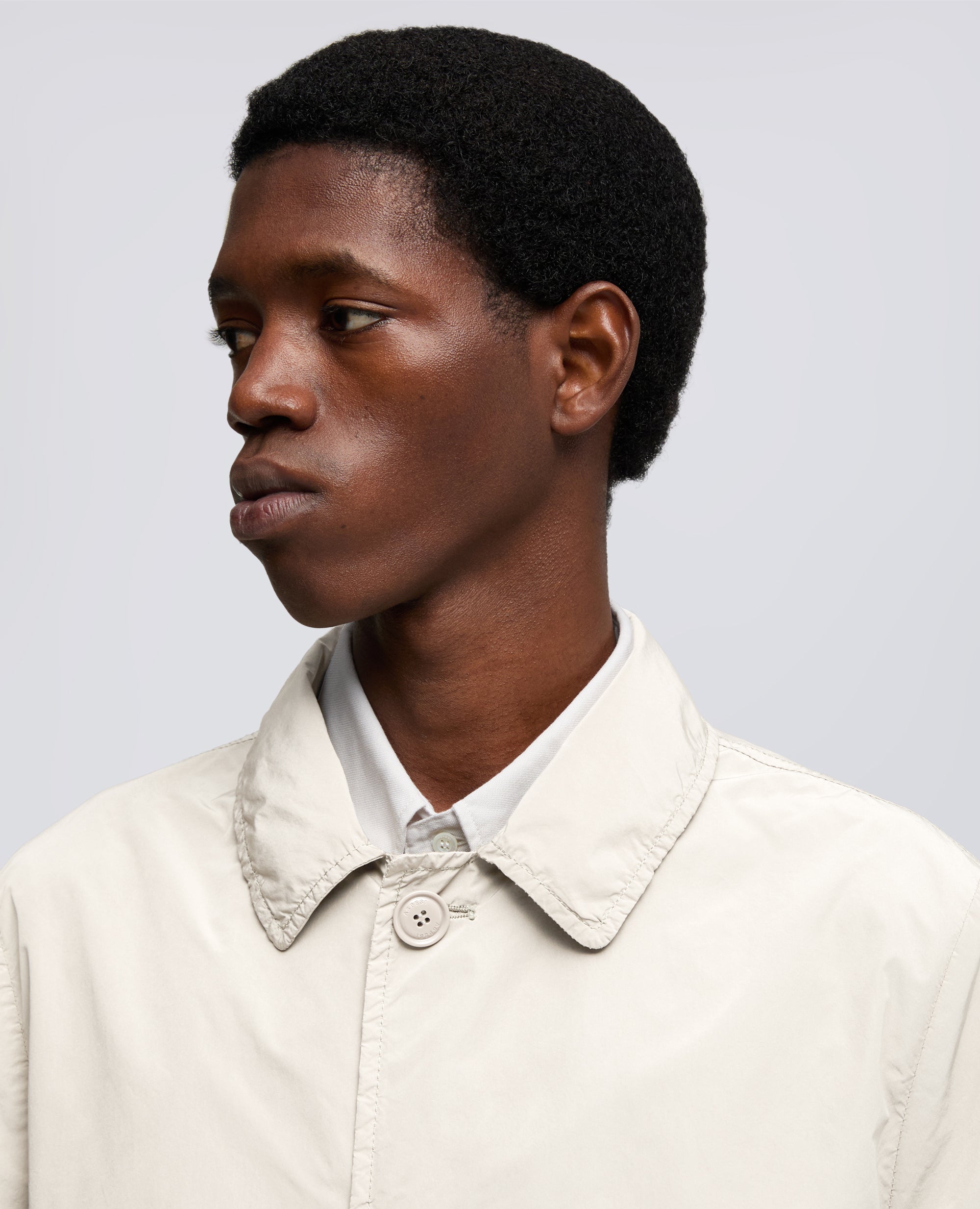 IMPERMEABILE IN POLIESTERE E NYLON COMPATTO-SASSO-STONE-PIEDRA-STEIN-PIERRE